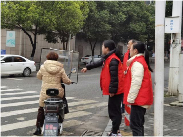 大祥区机关事务服务中心：学雷锋树新风，倡导文明出行(图1)
